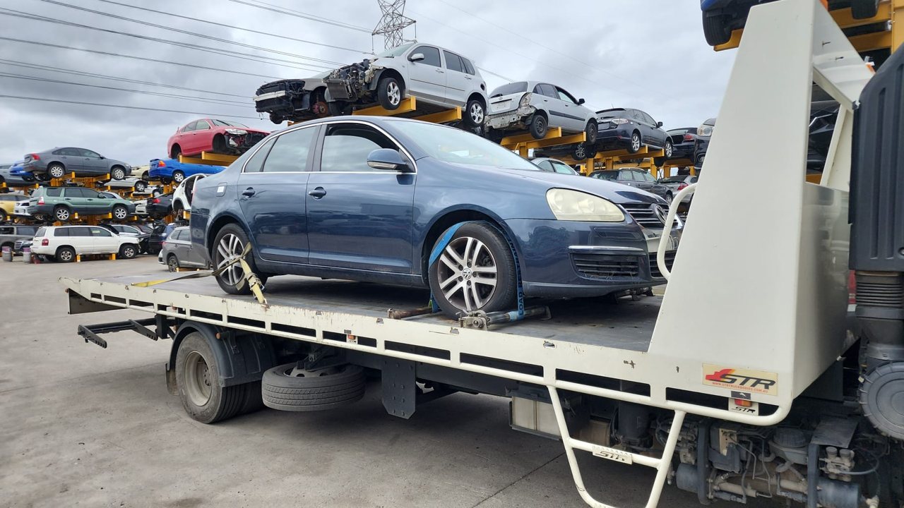 Blue sedan ready for vehicle transport