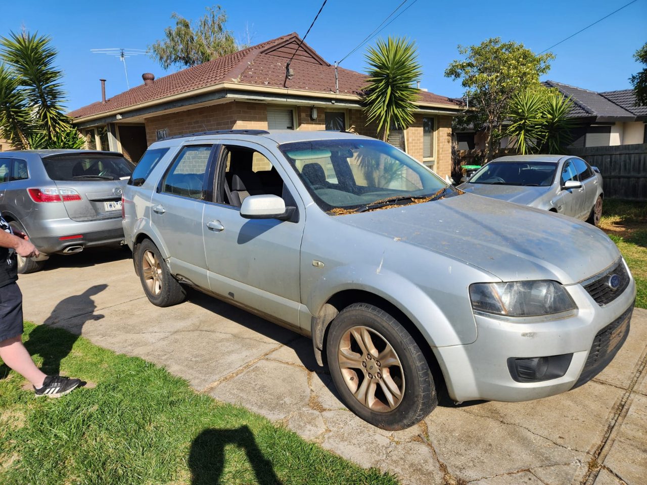 Silver utility vehicle parked outdoors
