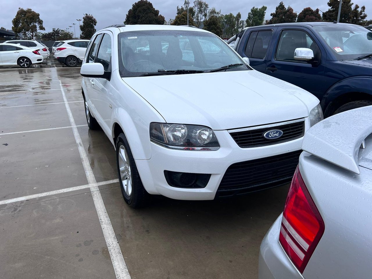 White SUV viewed from the front