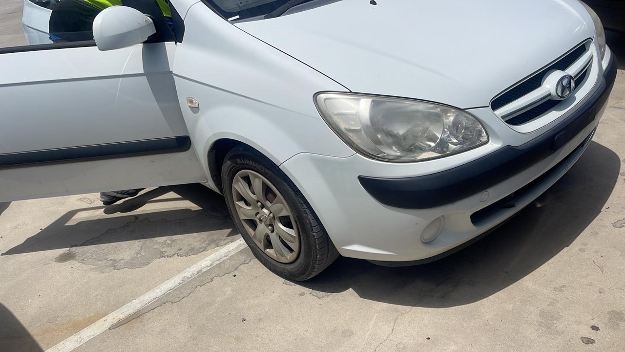 Silver compact hatchback viewed from the front