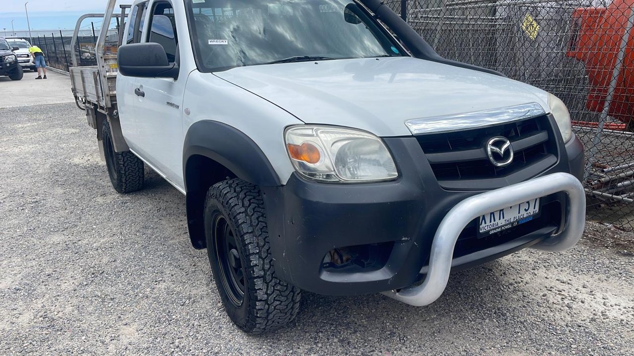 White utility vehicle viewed from the front
